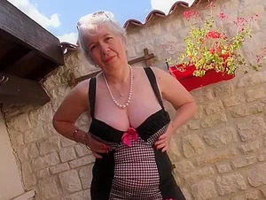 Caroline - British horny granny playing outside