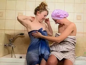 Hairy Lesbians Yulja & Elegiya have fun in the bath.